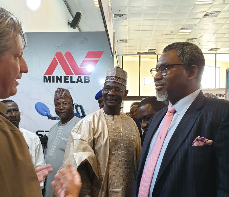 Nigeria's Minister of Mines and Steel Development of Nigeria, Arc. Olamilekan Adegbite, visits the Minelab stand at Nigeria Mining Week in Abuja in 2019.